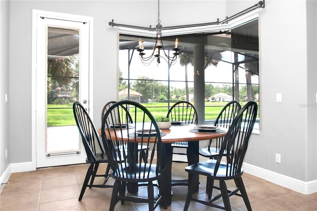 1441 Foxtail Ct, Lake Mary, FL 32746 - dining area with tile patterned floors and a chandelier