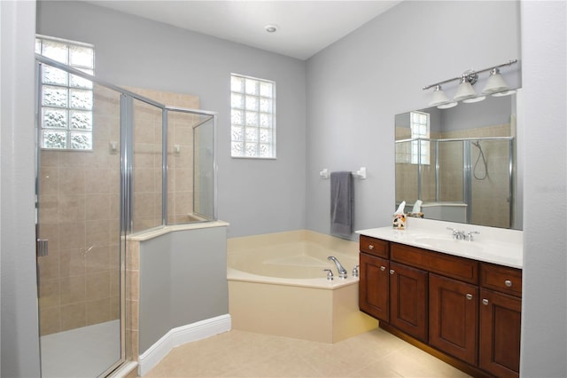 1441 Foxtail Ct, Lake Mary, FL 32746 - full bathroom with a bath, a shower stall, vanity, and tile patterned floors