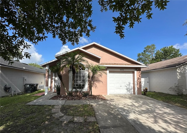 1470 Daniels Cove Dr, Winter Garden, FL 34787 - single story home featuring stucco siding, driveway, an attached garage, and a front lawn