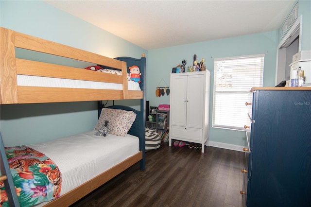1470 Daniels Cove Dr, Winter Garden, FL 34787 - bedroom featuring wood finished floors and multiple windows