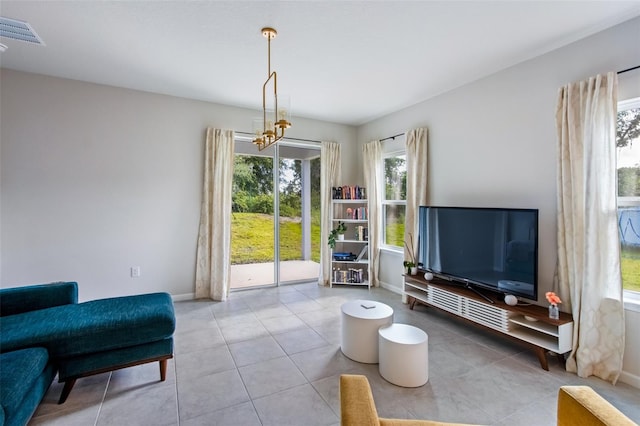 5029 Grand Teton Ct, Deland, FL 32724 - living area featuring plenty of natural light and tile patterned flooring