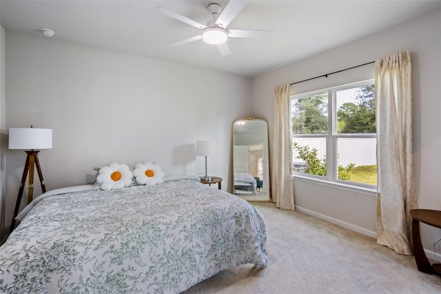 5029 Grand Teton Ct, Deland, FL 32724 - bedroom with light carpet and ceiling fan