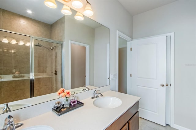 5029 Grand Teton Ct, Deland, FL 32724 - bathroom featuring double vanity and a stall shower