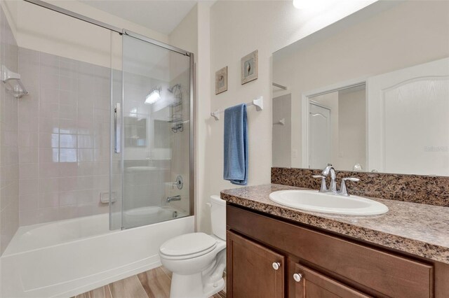 3210 Sonesta Ct Unit B, Clermont, FL 34711 - bathroom featuring vanity and enclosed tub / shower combo
