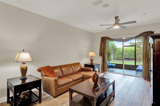 3210 Sonesta Ct Unit B, Clermont, FL 34711 - living area with ceiling fan and light wood-style floors