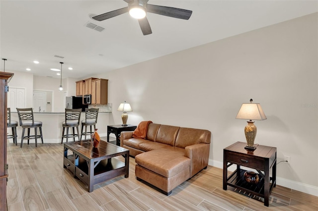 3210 Sonesta Ct Unit B, Clermont, FL 34711 - living room featuring light wood-type flooring, recessed lighting, and a ceiling fan