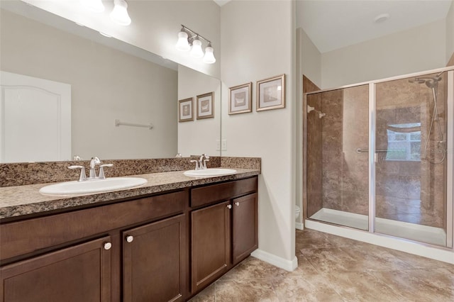 3210 Sonesta Ct Unit B, Clermont, FL 34711 - bathroom featuring double vanity, a shower stall, and tile patterned flooring