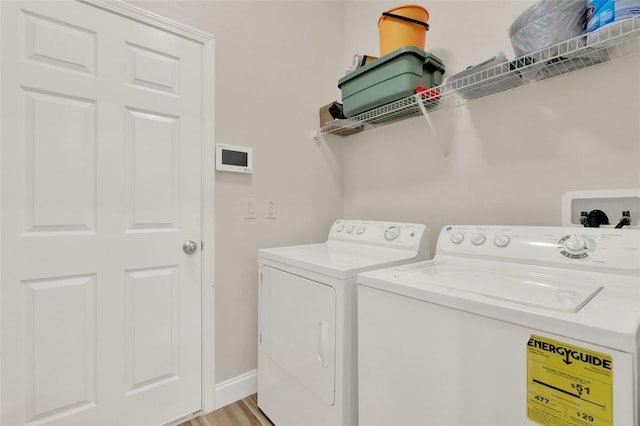 3210 Sonesta Ct Unit B, Clermont, FL 34711 - laundry room featuring washer and dryer and light wood-type flooring