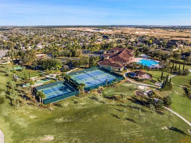 3210 Sonesta Ct Unit B, Clermont, FL 34711 - aerial view of property's location with a pool and nearby suburban area