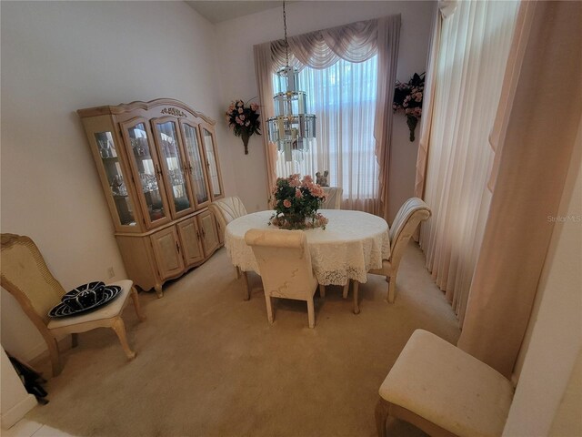8603 Snowfire Dr, Orlando, FL 32818 - dining area with light colored carpet