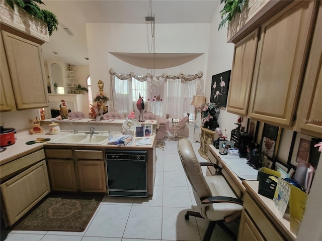 8603 Snowfire Dr, Orlando, FL 32818 - kitchen featuring black dishwasher, a peninsula, light countertops, light tile patterned floors, and an office area