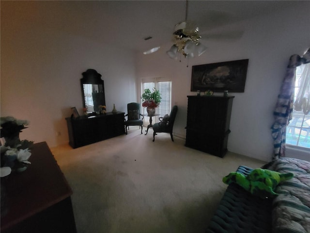 8603 Snowfire Dr, Orlando, FL 32818 - living area with carpet floors and a ceiling fan