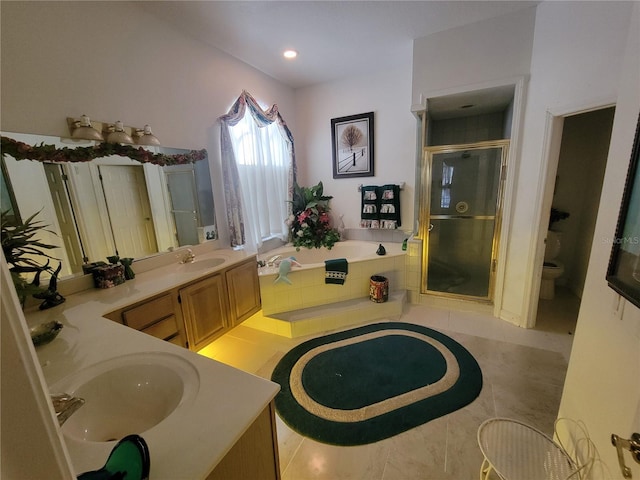 8603 Snowfire Dr, Orlando, FL 32818 - full bathroom featuring a shower stall, a garden tub, and double vanity
