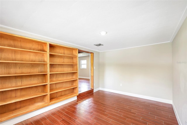 1204 Marie Ave, Apopka, FL 32703 - empty room with dark wood-type flooring and recessed lighting