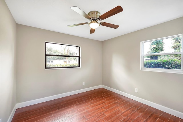 1204 Marie Ave, Apopka, FL 32703 - spare room with wood finished floors and ceiling fan