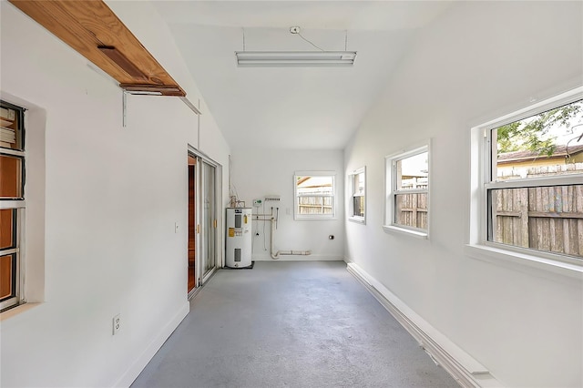 1204 Marie Ave, Apopka, FL 32703 - interior space with electric water heater, healthy amount of natural light, and lofted ceiling