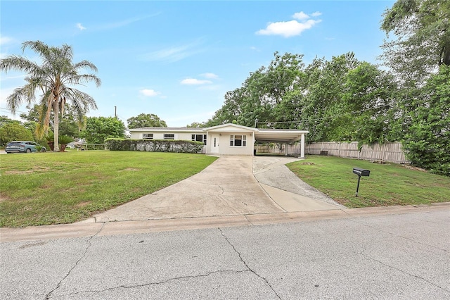 1204 Marie Ave, Apopka, FL 32703 - view of front of house with an attached carport and concrete driveway