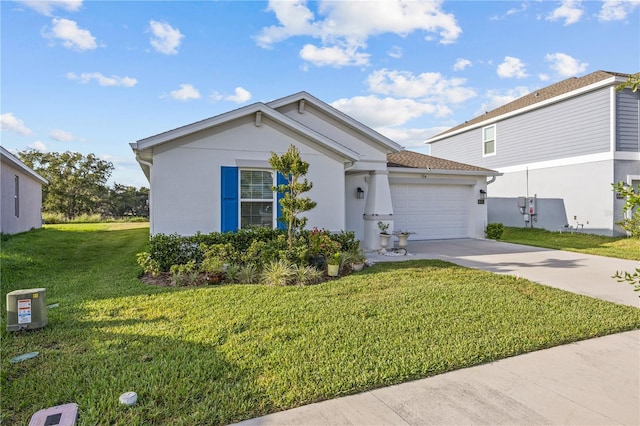 873 Daring Dr, Davenport, FL 33837 - view of front of home with stucco siding, concrete driveway, an attached garage, and a front yard