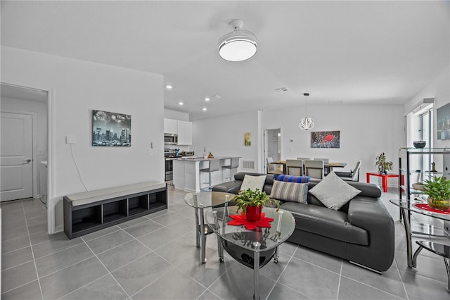 873 Daring Dr, Davenport, FL 33837 - living area featuring light tile patterned floors and recessed lighting