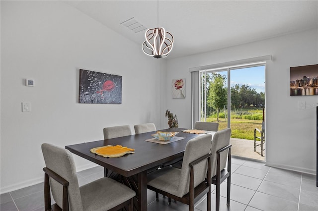 873 Daring Dr, Davenport, FL 33837 - dining space featuring a chandelier and light tile patterned floors