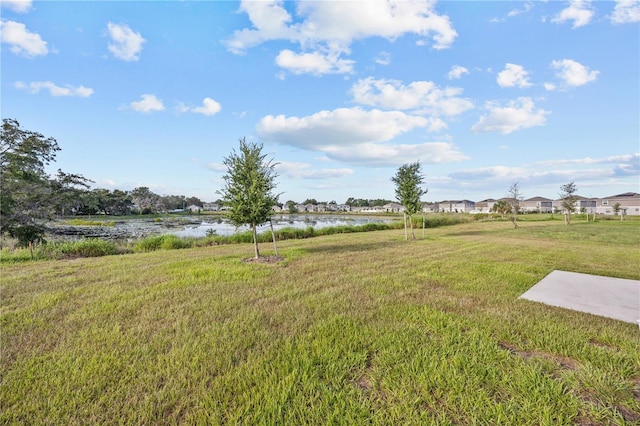 873 Daring Dr, Davenport, FL 33837 - view of green lawn featuring a water view