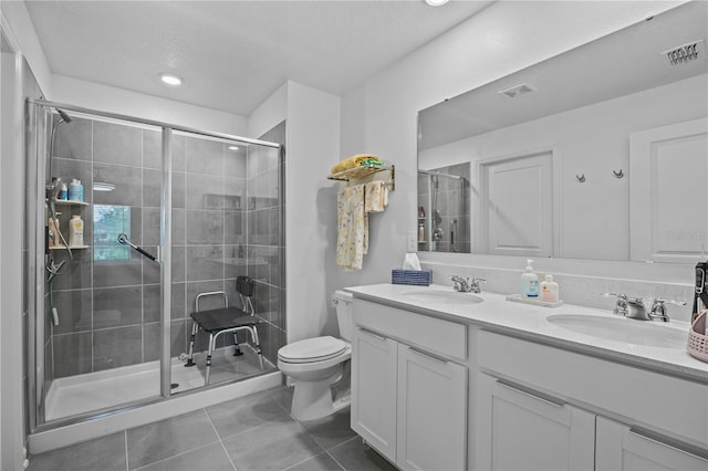 873 Daring Dr, Davenport, FL 33837 - full bathroom featuring tile patterned flooring, double vanity, a stall shower, and recessed lighting