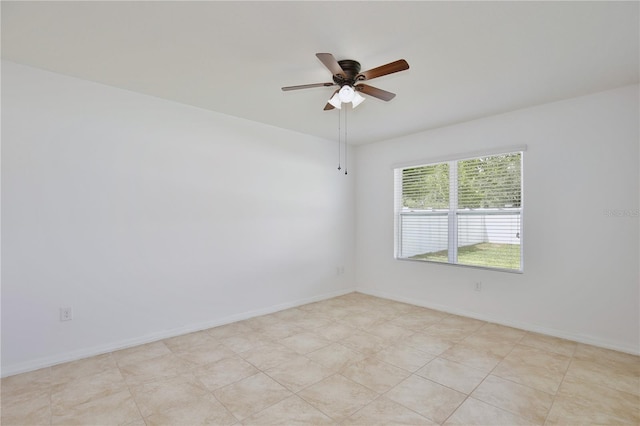 1565 Diamond Loop Dr, Kissimmee, FL 34744 - unfurnished room with ceiling fan and baseboards
