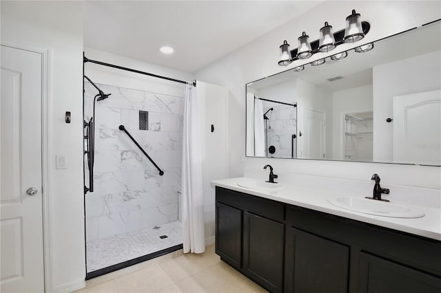 1565 Diamond Loop Dr, Kissimmee, FL 34744 - bathroom with a marble finish shower, double vanity, tile patterned flooring, recessed lighting, and a spacious closet