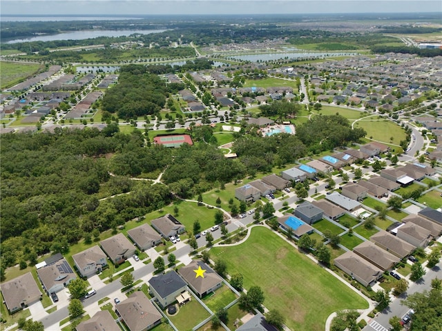 1565 Diamond Loop Dr, Kissimmee, FL 34744 - aerial view of property's location with a nearby body of water and nearby suburban area