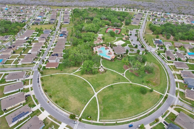1565 Diamond Loop Dr, Kissimmee, FL 34744 - aerial view of property's location featuring nearby suburban area and a pool