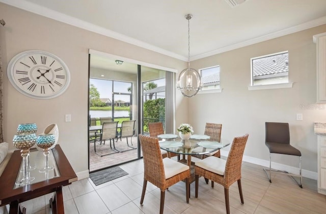13084 Rinella St, Venice, FL 34293 - dining space featuring crown molding, light tile patterned floors, a chandelier, and a water view
