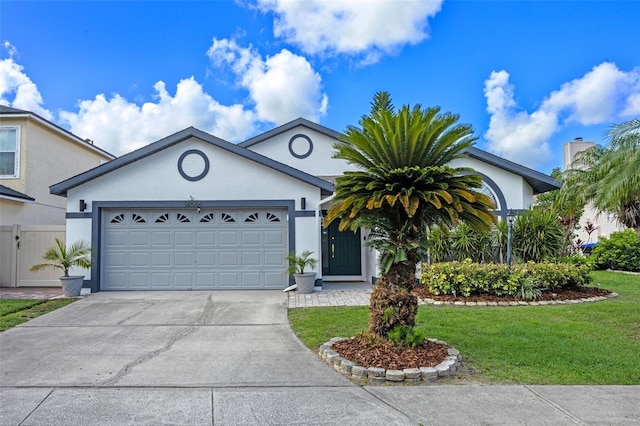 14566 Quail Trail Cir, Orlando, FL 32837 - single story home featuring stucco siding, concrete driveway, and an attached garage