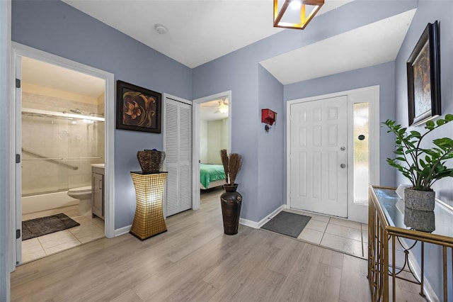 14566 Quail Trail Cir, Orlando, FL 32837 - foyer featuring light wood-style floors and ceiling fan