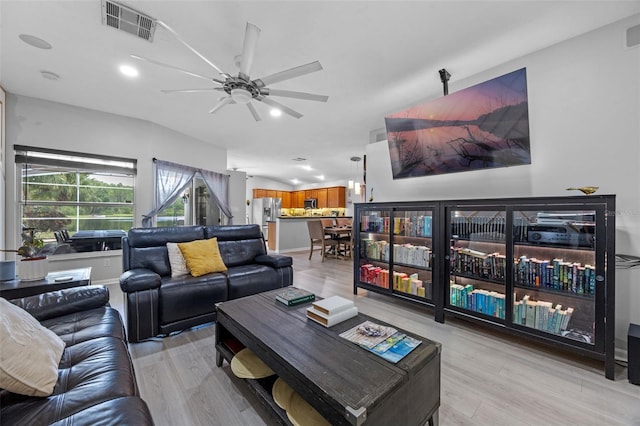 14566 Quail Trail Cir, Orlando, FL 32837 - living room with light wood-style flooring, ceiling fan, and recessed lighting