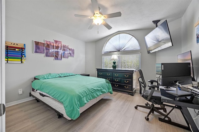 14566 Quail Trail Cir, Orlando, FL 32837 - bedroom featuring light wood-type flooring, a desk, a ceiling fan, and vaulted ceiling