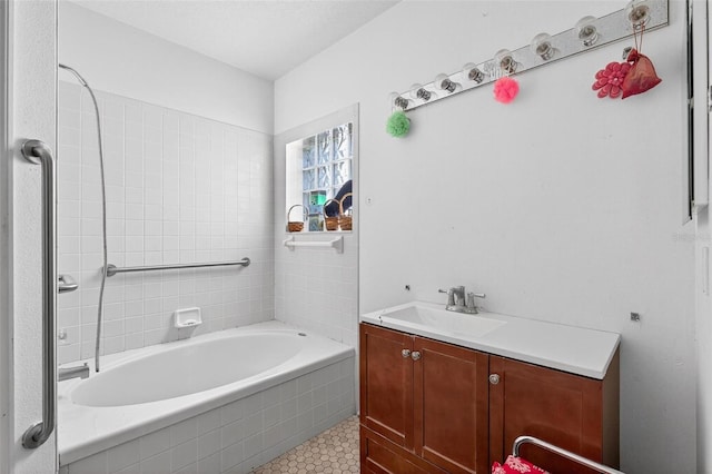 2076 Shannon Lakes Blvd, Kissimmee, FL 34743 - full bathroom with a bathtub, vanity, and tile patterned floors