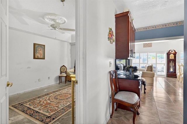 2076 Shannon Lakes Blvd, Kissimmee, FL 34743 - hallway featuring a textured ceiling and baseboards