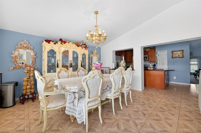 2076 Shannon Lakes Blvd, Kissimmee, FL 34743 - dining room with a chandelier and lofted ceiling