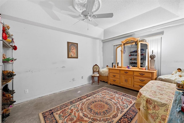 2076 Shannon Lakes Blvd, Kissimmee, FL 34743 - bedroom with concrete floors, a ceiling fan, and a textured ceiling