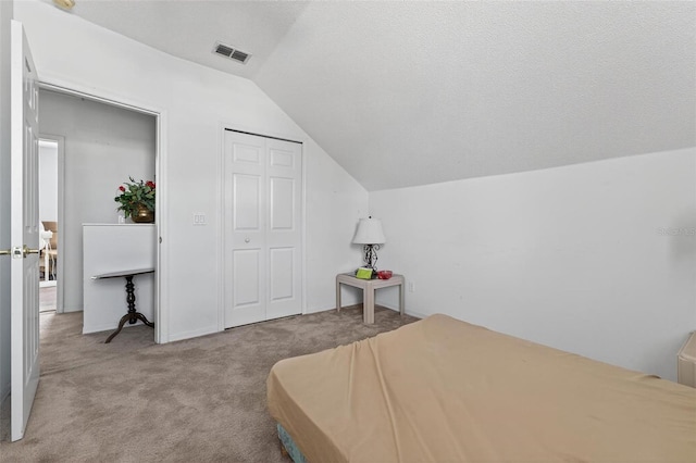 2076 Shannon Lakes Blvd, Kissimmee, FL 34743 - bedroom featuring lofted ceiling, carpet, and a closet