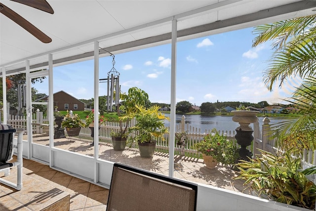 2076 Shannon Lakes Blvd, Kissimmee, FL 34743 - unfurnished sunroom with a water view