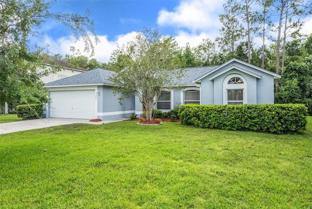 10675 Fairhaven Way, Orlando, FL 32825 - single story home featuring stucco siding, driveway, an attached garage, and a front yard