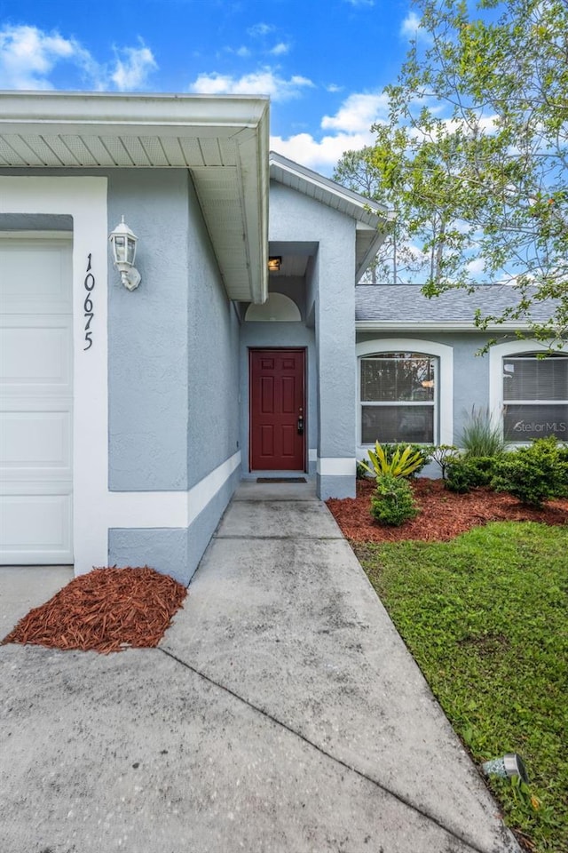 10675 Fairhaven Way, Orlando, FL 32825 - property entrance featuring stucco siding