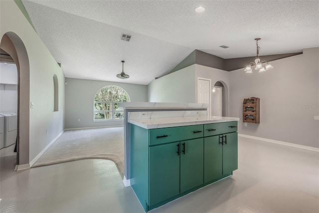 10675 Fairhaven Way, Orlando, FL 32825 - kitchen with green cabinetry, arched walkways, a textured ceiling, a chandelier, and vaulted ceiling