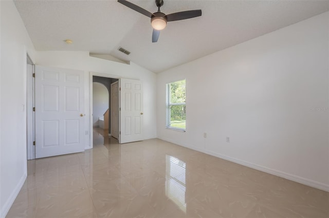 10675 Fairhaven Way, Orlando, FL 32825 - unfurnished bedroom featuring lofted ceiling and a ceiling fan