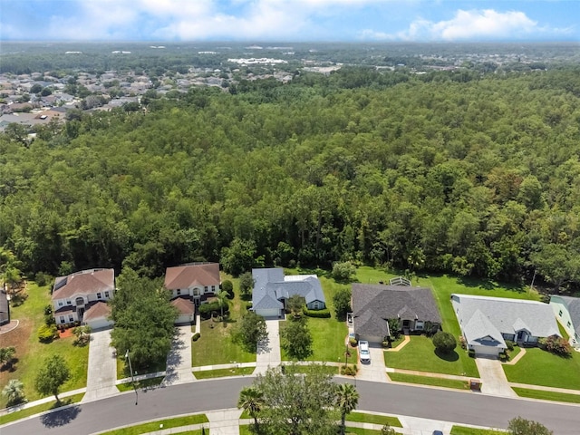 10675 Fairhaven Way, Orlando, FL 32825 - aerial view of residential area featuring a heavily wooded area