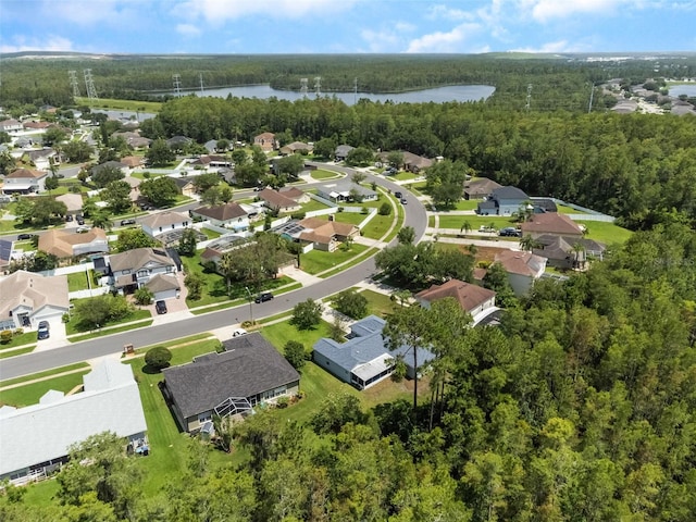 10675 Fairhaven Way, Orlando, FL 32825 - aerial perspective of suburban area with a nearby body of water and a heavily wooded area