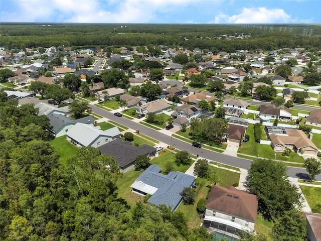 10675 Fairhaven Way, Orlando, FL 32825 - aerial perspective of suburban area featuring a heavily wooded area
