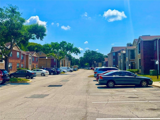 5500 Devonbriar Way Unit 202, Orlando, FL 32822 - view of asphalt road with a residential view