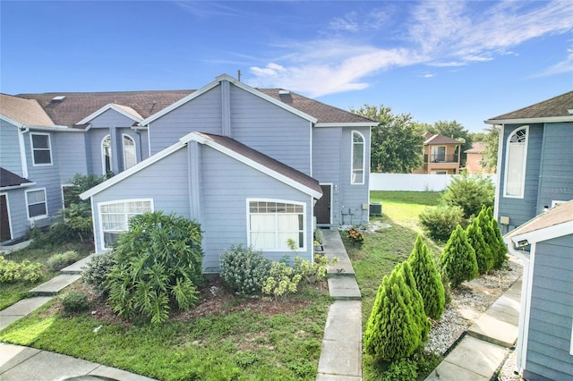 709 Orchid Dr, Davenport, FL 33897 - view of property exterior featuring a cooling unit